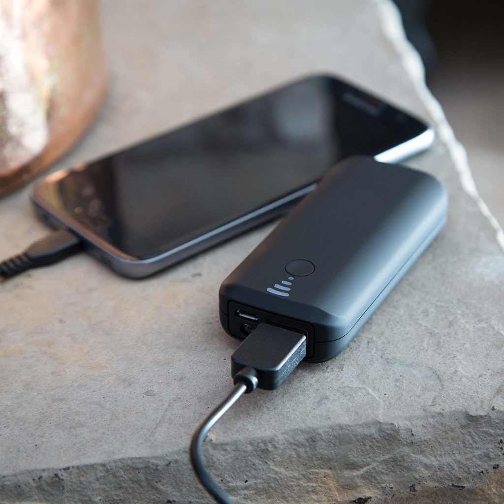 A portable phone charger charging phone: an essential element of your Disney vacation planning