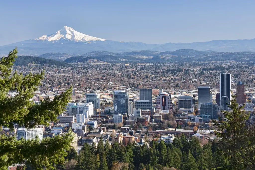View of Mount Hood behind the Portland City skyline Oregon Travel Guide.