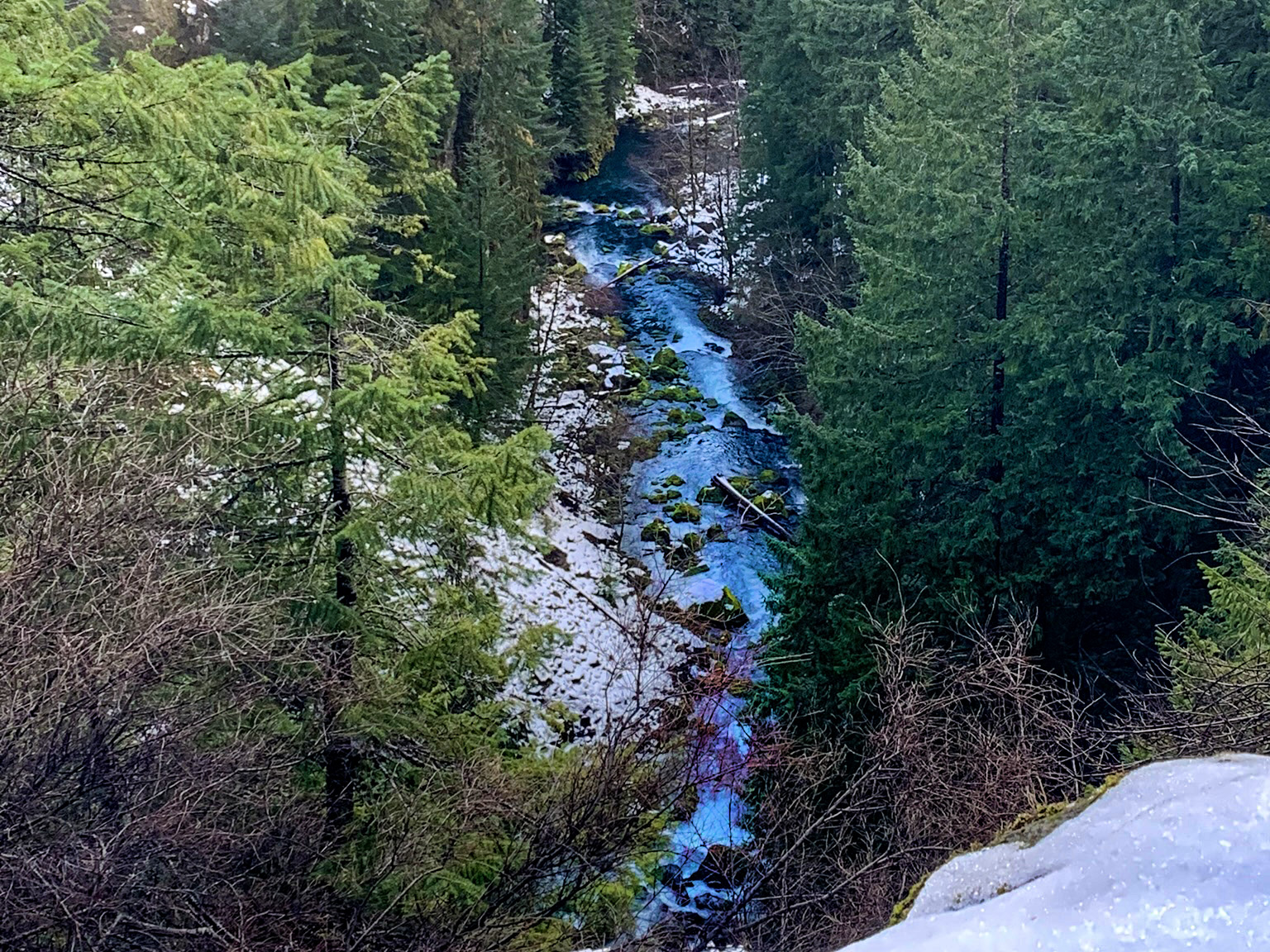 Blue water river running through the gorge away from Tokatee Falls