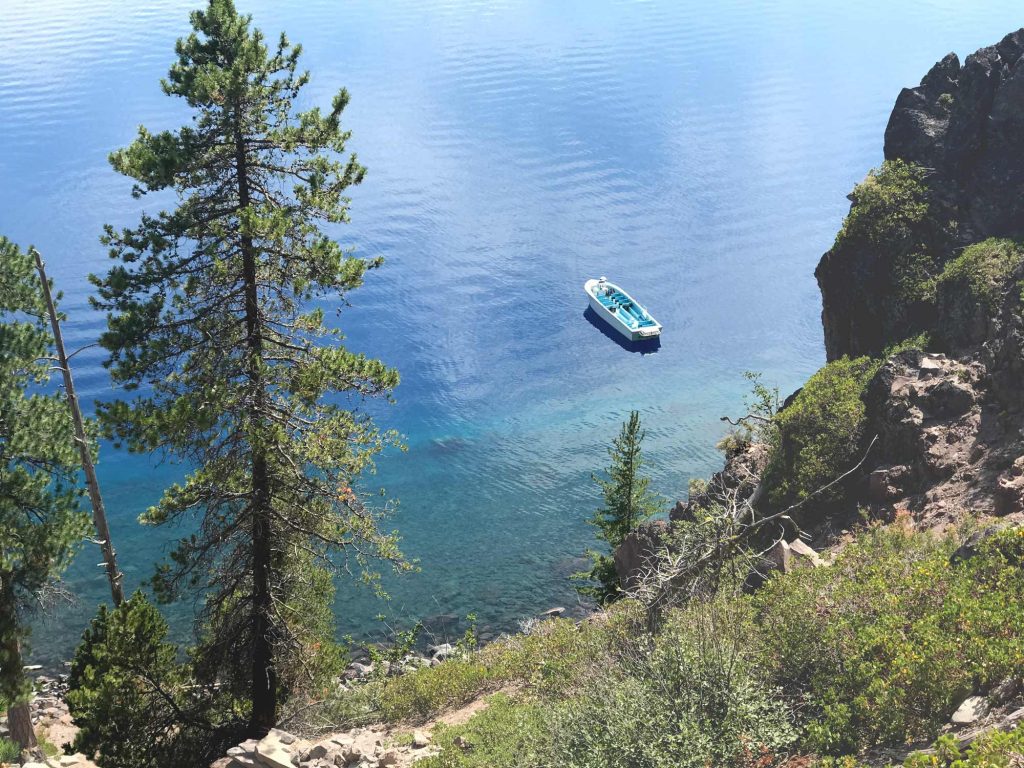 A boat on Crater Lake, a popular Oregon vacation destination