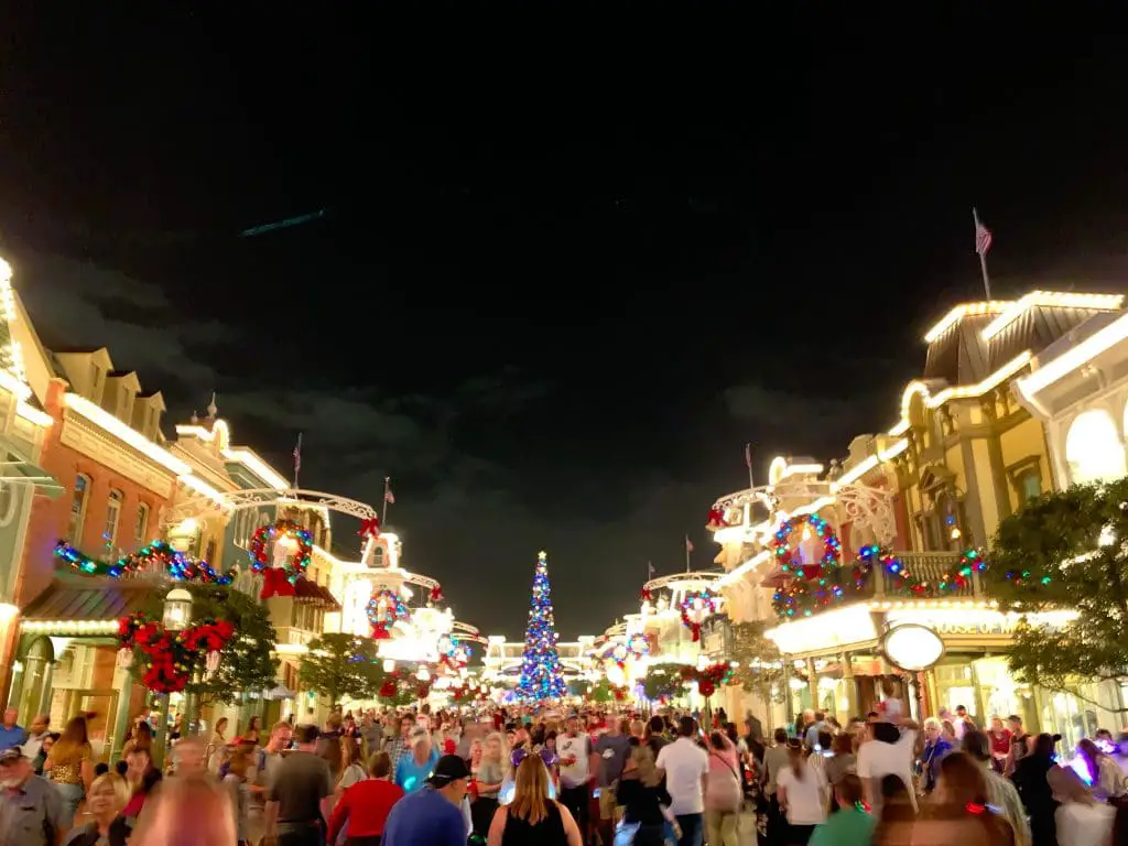 Crowds on Main Street on a winter night in Disney World