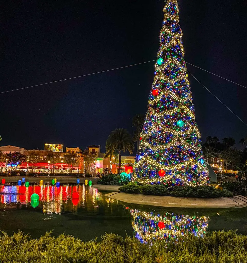Christmas tree and decorations at night at Disney's Hollywood Studios