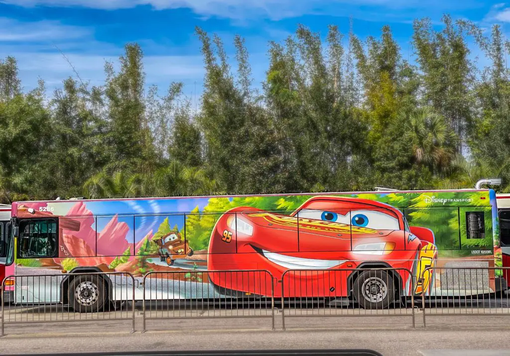 Disney World bus wrapped in Cars movie theme.