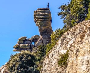 rock climbers scale a formation on ARizona's Mount Lemmon Highway.