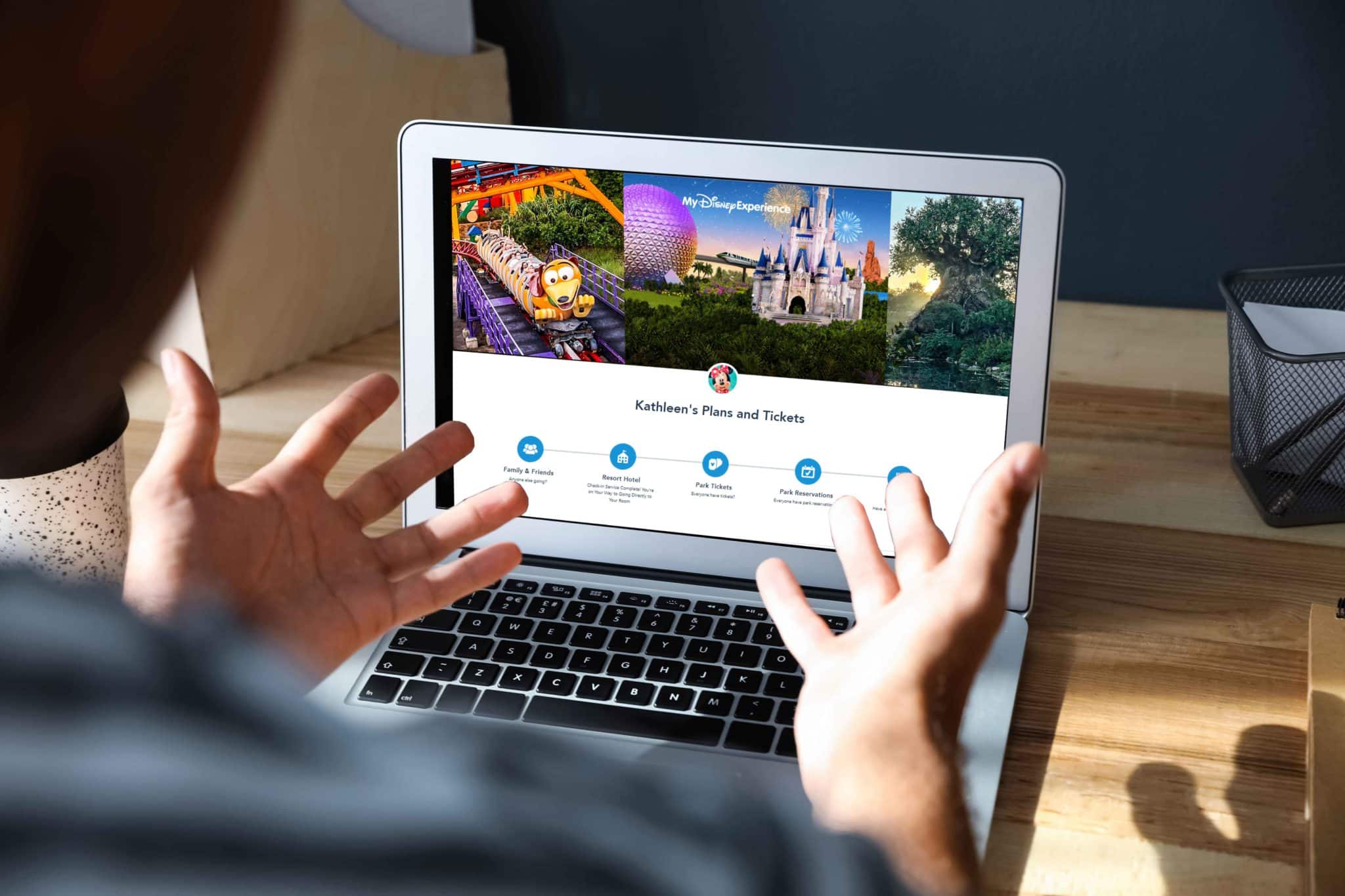 Frustrated person trying to book a Disney World vacation on a computer without a Walt Disney World travel agent.