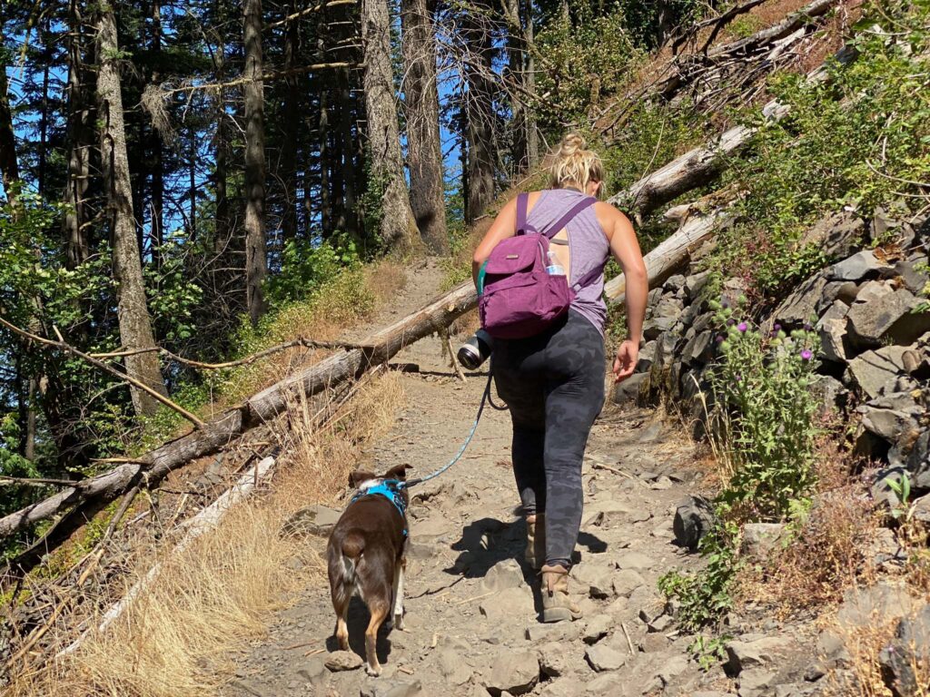 Ali Patton, travel writer, on the trail with her favorite hiking companion, Kimber.