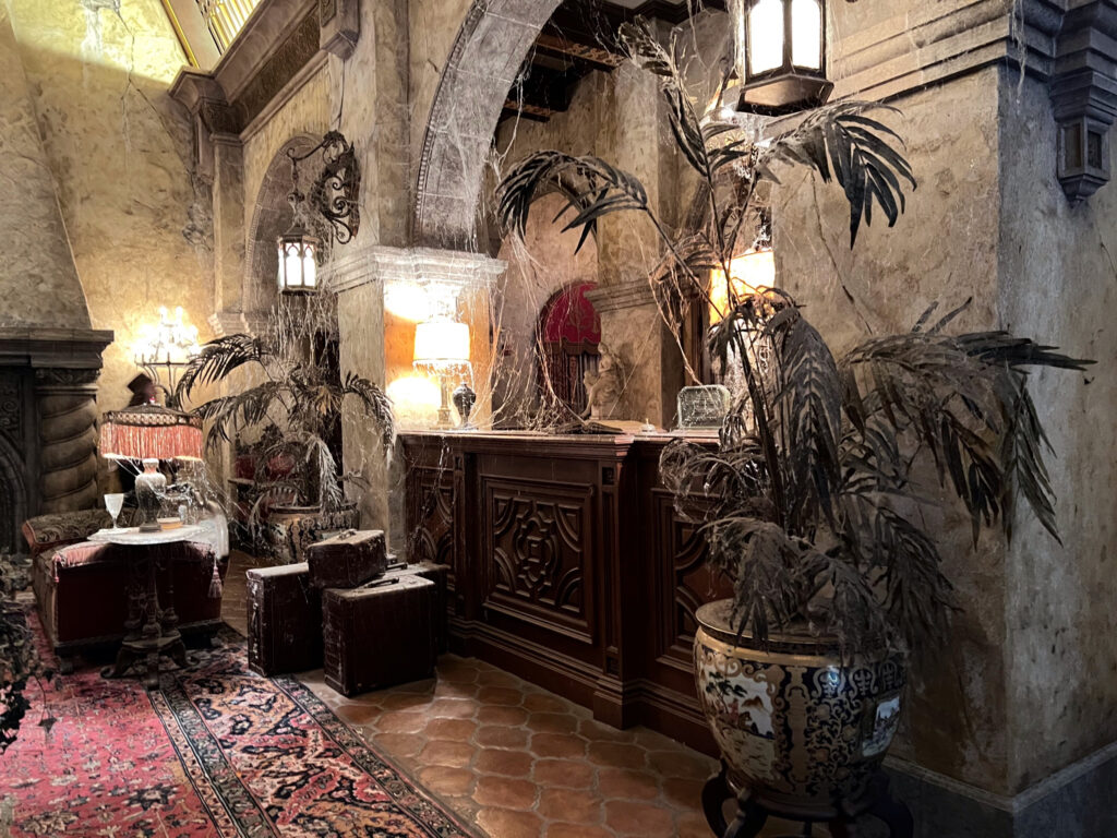 hotel lobby strewn with cobwebs at Hollywood Studios Tower of Terror