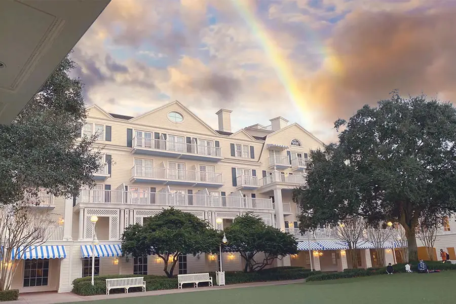 Exterior of Boardwalk Inn with a rainbow.