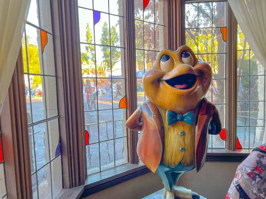 Mr. Toad poses for a picture at the entry to Mr. Toad's Wild Ride found only at Disneyland park in California