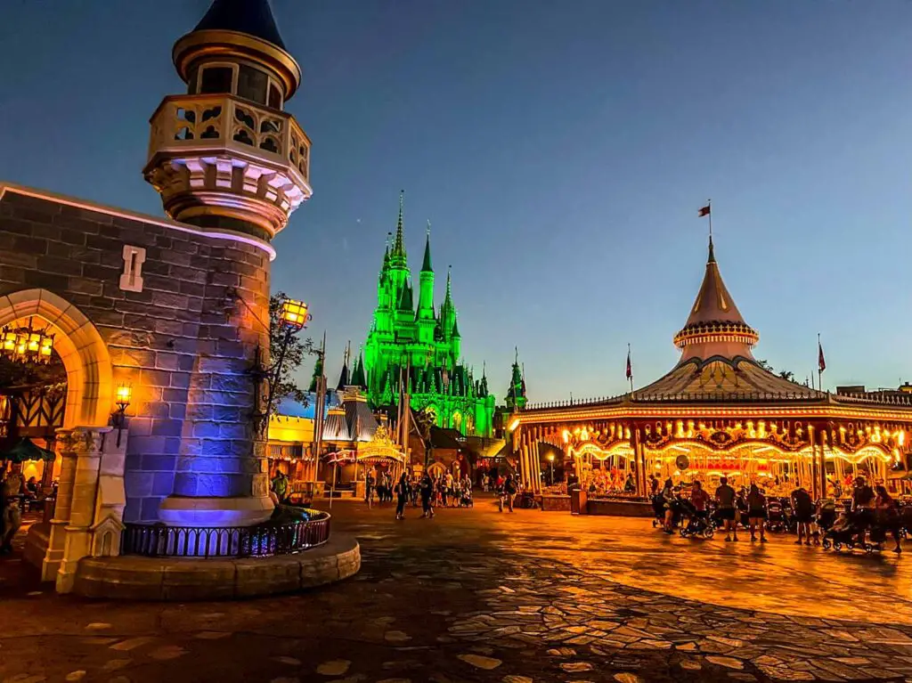 Cinderella's Castle bathed in green light for the Mickey's Not So Scary Halloween Party; Holidays at Disney World