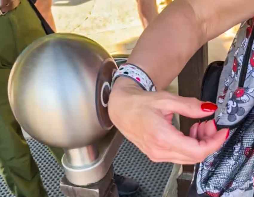 Disney world first timer scans MagicBand at Park gate.
