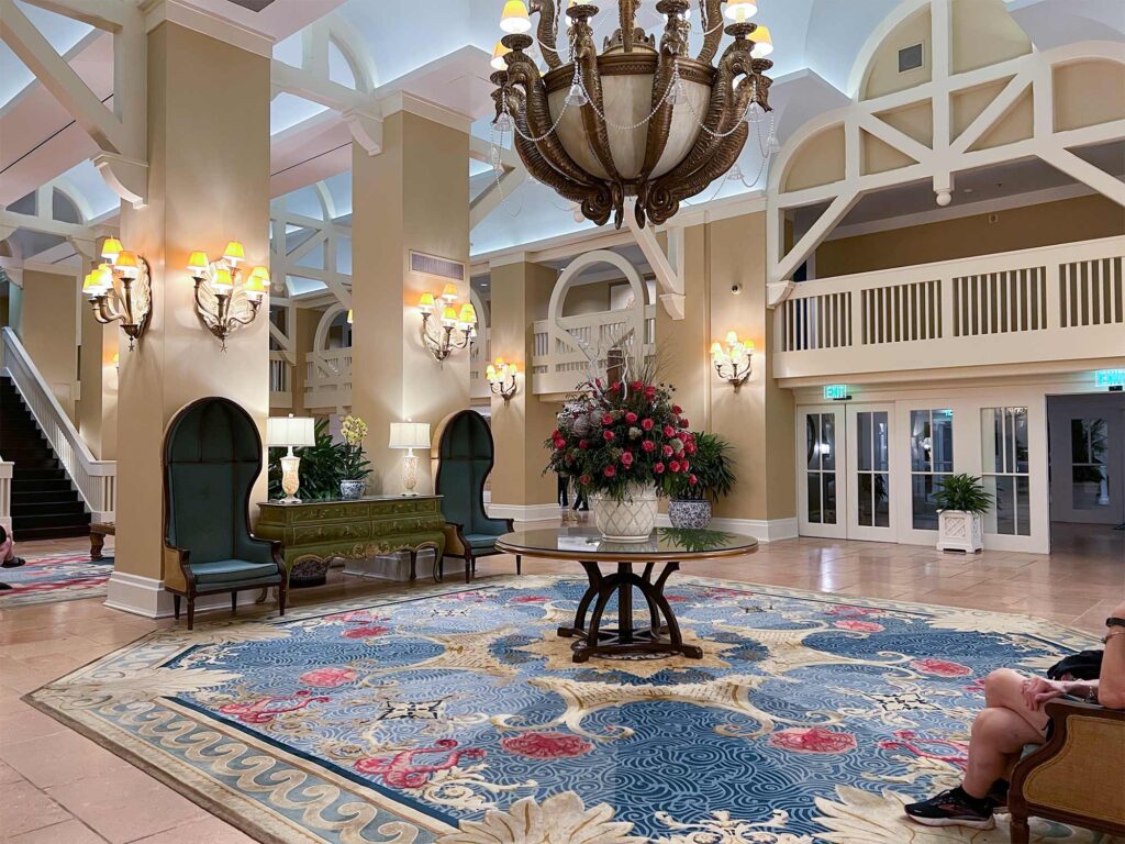 Lobby with blue, white and gold accents at Disney World Beach Club Resort.