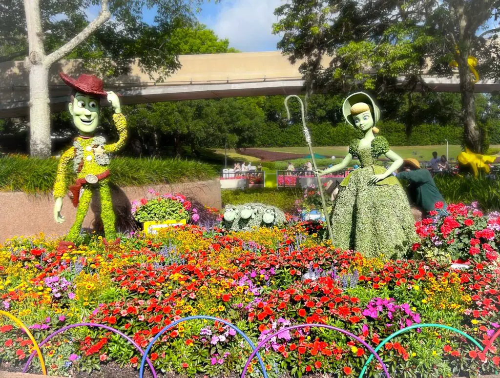 Toy Story topiiaray featuring Wood and Bo Peep at EPCOT Flower Garden Festival
