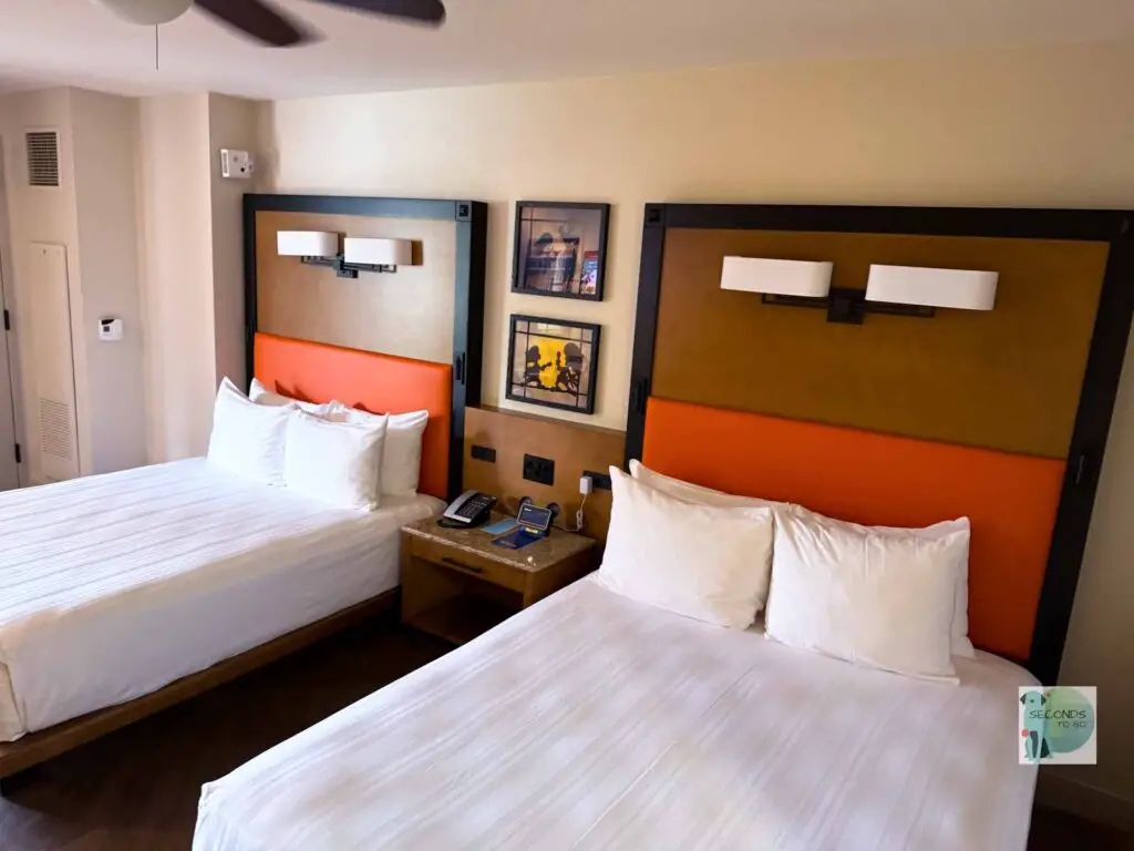 Queen beds in a standard room at Walt Disney Coronado Springs Resort.