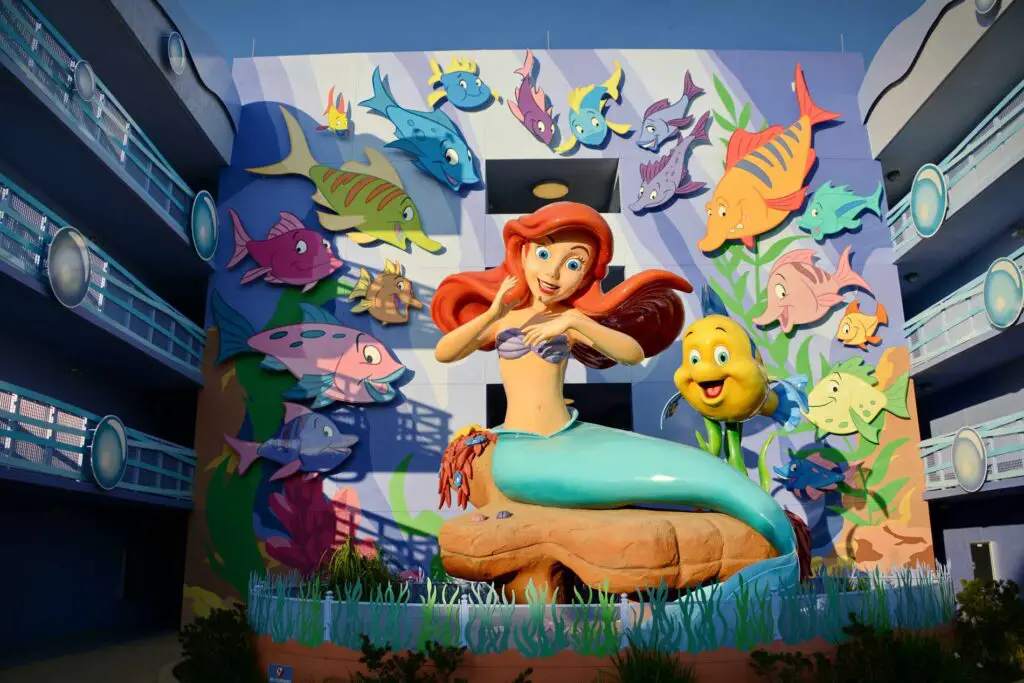 A giant Little Mermaid figure adorns the exterior of  Disney's Art of Animation, a hotel on the Disney resort list.