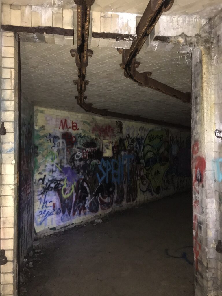 Ammunitions tracks on the ceiling of the Fort Wetherill Tunnels 