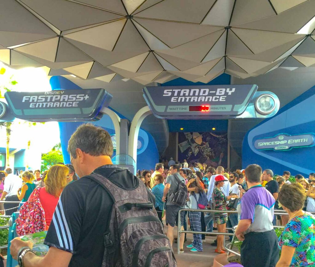 Early crowds gather outside Spaceship Earth Disney World in July