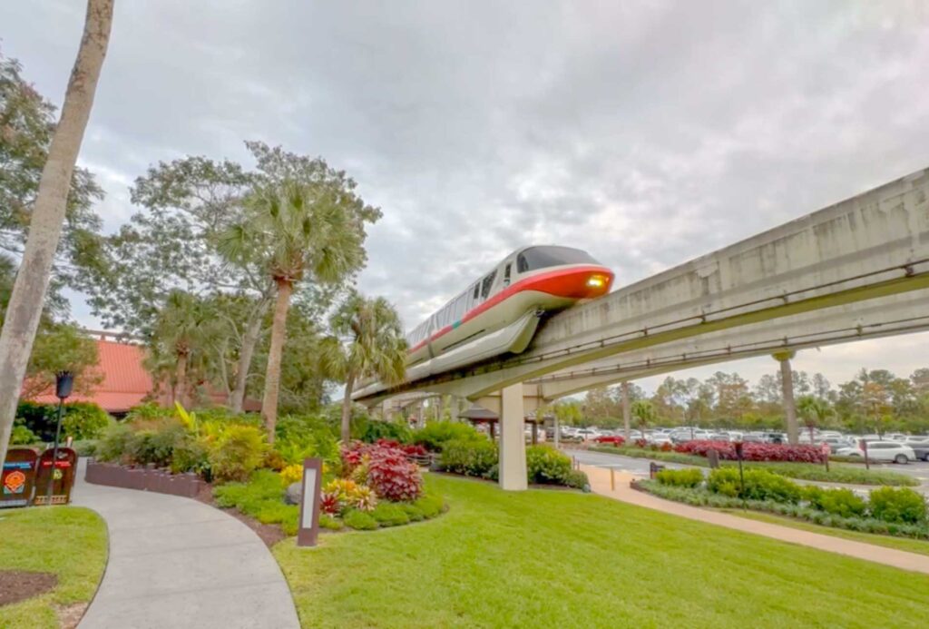 Walt Disney World monorail travels the beam through Disney's Polynesian Village Resort.