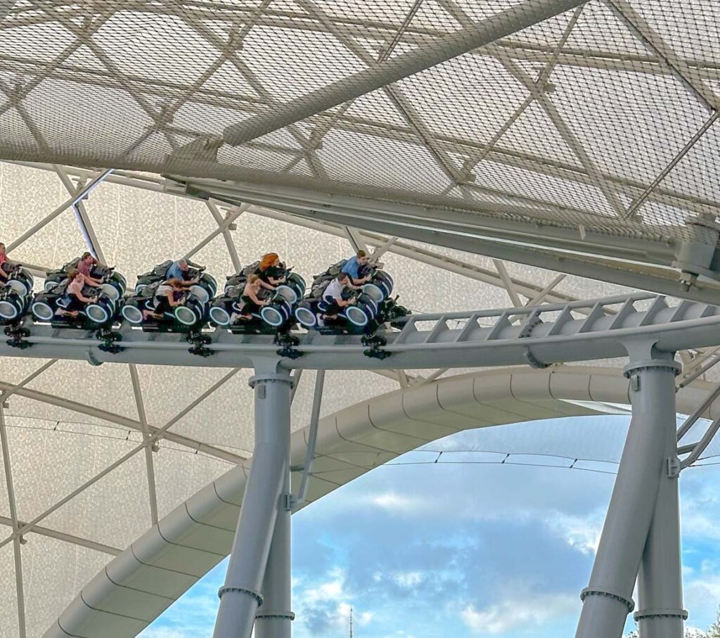 Riders on TRON LIghtcycle Run using a Disney World Lightning Lane Single Pass