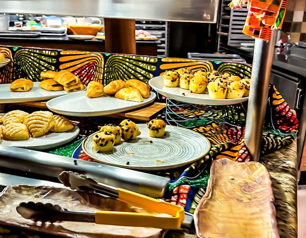 Baked goods on a buffet line served at Disney World Animal Kingdom Boma restaurant.