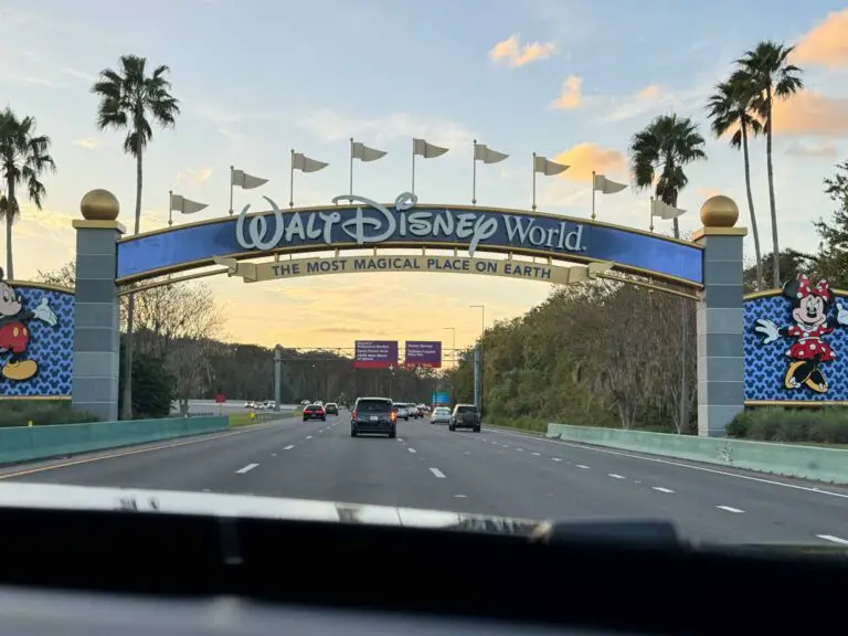 Disney World welcome sign featuring Mickey and Minnie as seen when renting a car at Disney World