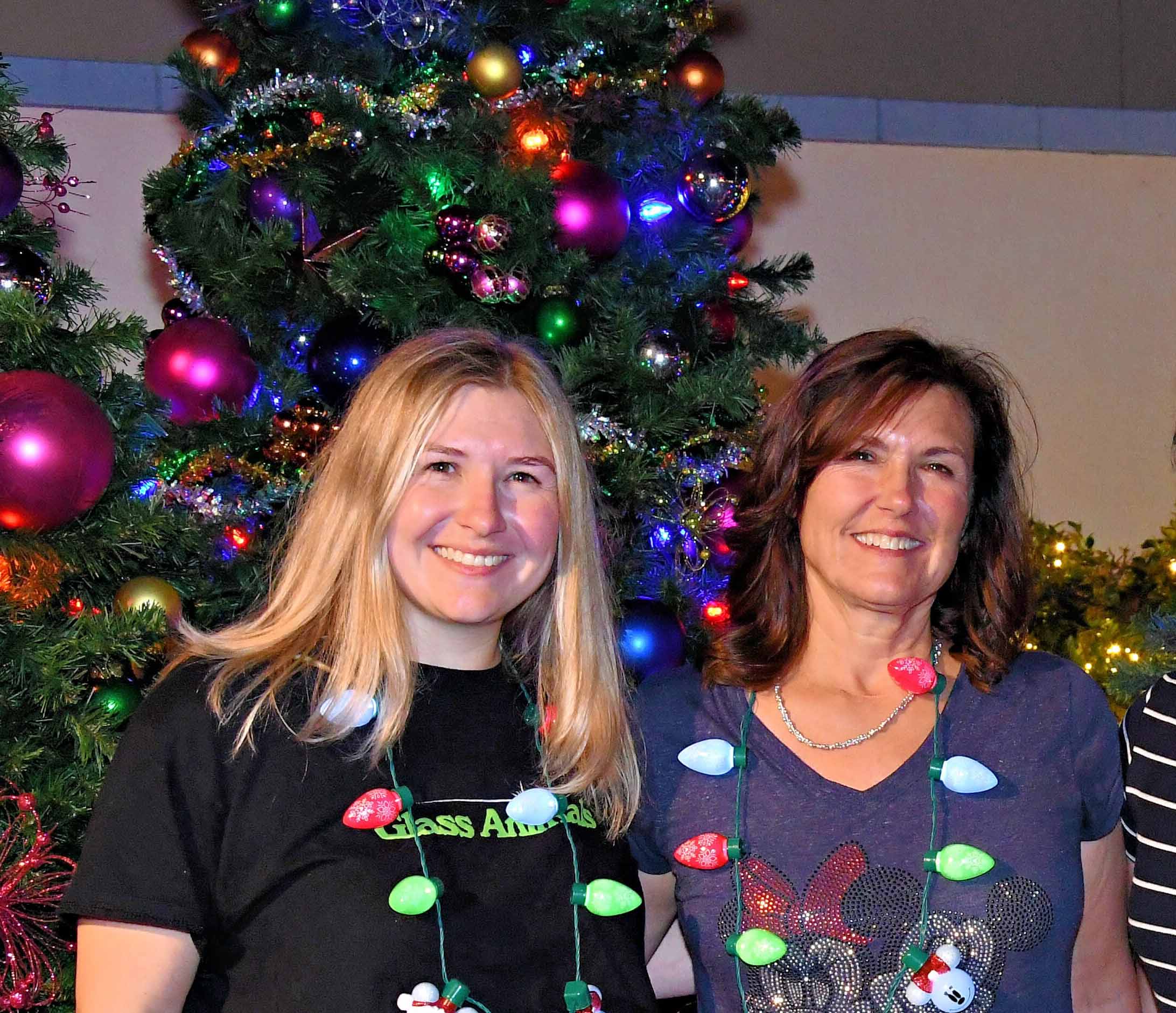 Kathleen Hesketh and Taryn Hesketh pose for a Photopass Photo at Disney World Jollywood Nights