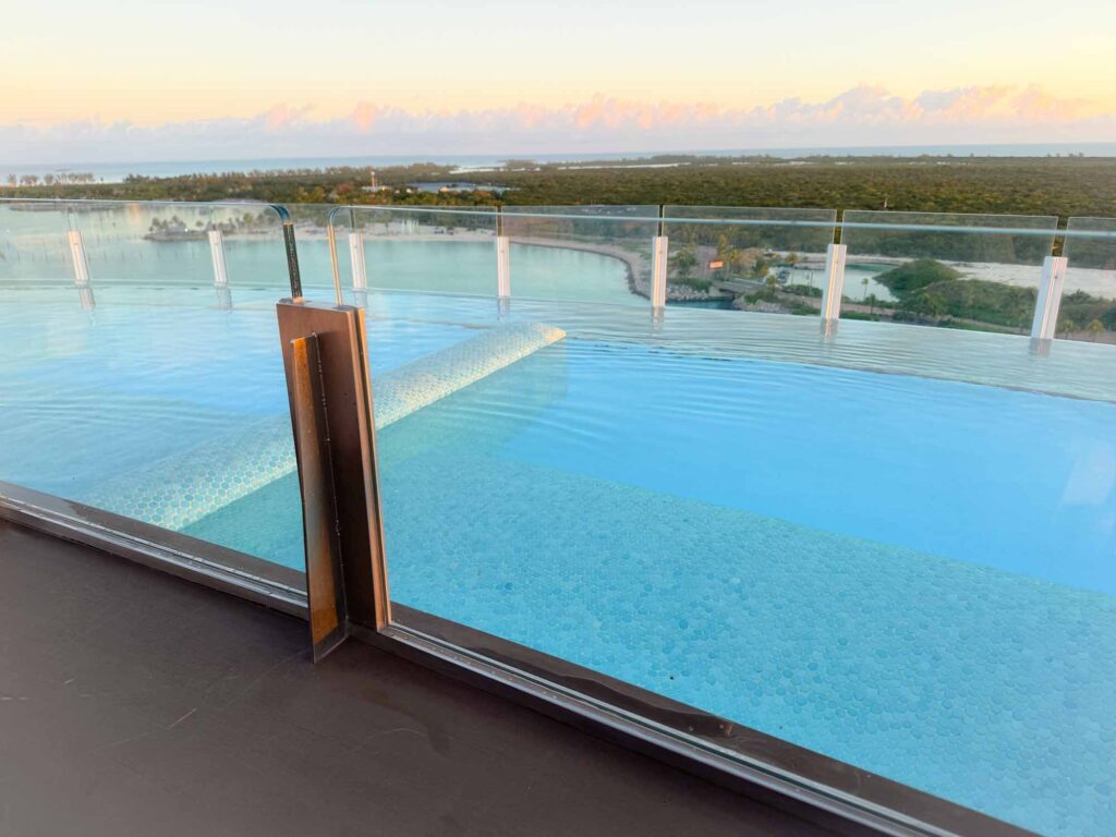 The Quiet Cove Pool overlooking Castaway Cay on a Disney Cruise for adults.