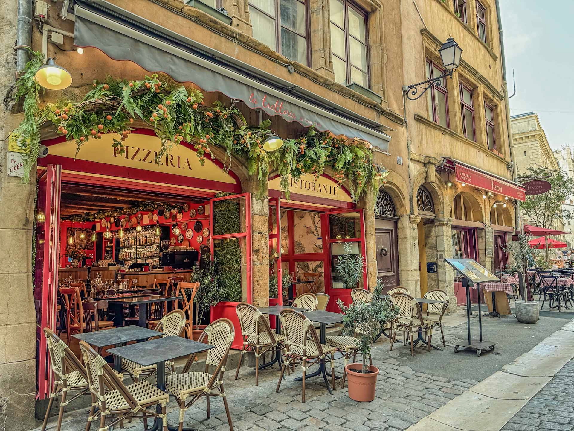 Senior Travel Abroad: How to Explore the World at Your Own Pace 3 Cafe's like this beautiful ochre restaurant in Lyon France, make a great place for senior travelers to stop, rest and soak in the culture.