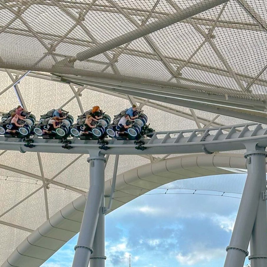 Riders on TRON LIghtcycle Run using a Disney World Lightning Lane Single Pass